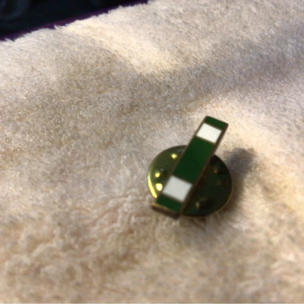 Green and White Enamel Lapel Pin with Gold Backing